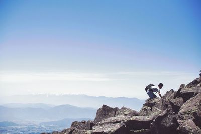 Scenic view of mountains against clear blue sky