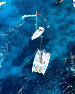 High angle view of sailboat on sea