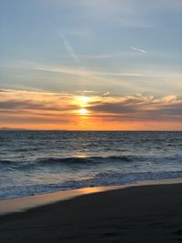 Scenic view of sea against sky during sunset