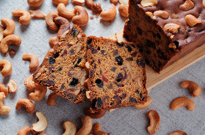 Sliced fruit cake with cashew nuts