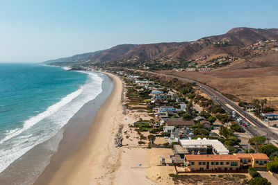 Luxury beachfront properties in malibu, california, drone view.