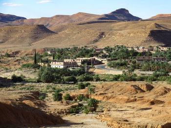 Scenic view of landscape and mountains against sky