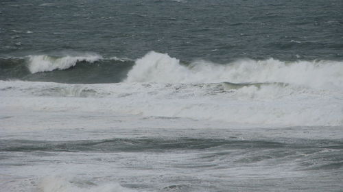 Waves splashing on shore