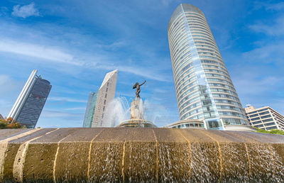 Low angle view of modern building against sky