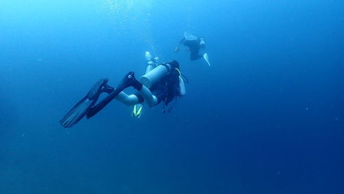Man scuba diving in sea
