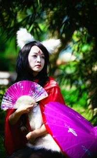 Portrait of young woman in traditional clothing