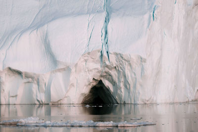 Close-up of icebergs against mountain