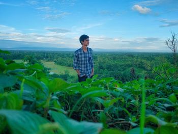 Full length of man on field against sky