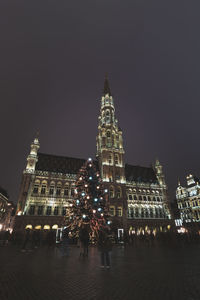 Illuminated buildings in city at night