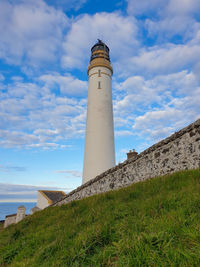 Low angle view of lighthouse against sky