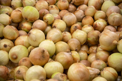 Full frame shot of onions for sale at market stall