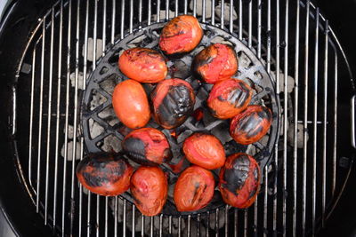 Close-up of tomatoes on barbecue grill