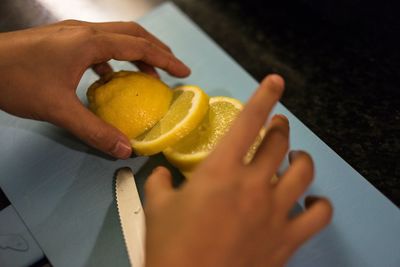 Close-up of hand holding apple