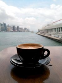 Close-up of coffee cup on table