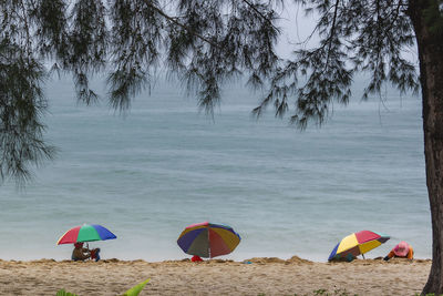 Thap sakae villagers make sand spas for tourists at thap sakae beach prachuap khiri khan, thailand.