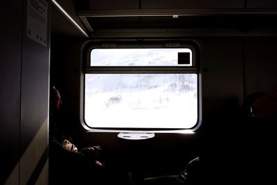 View of train through window