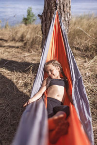 Women relaxing on field