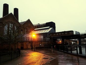 View of built structures at sunset