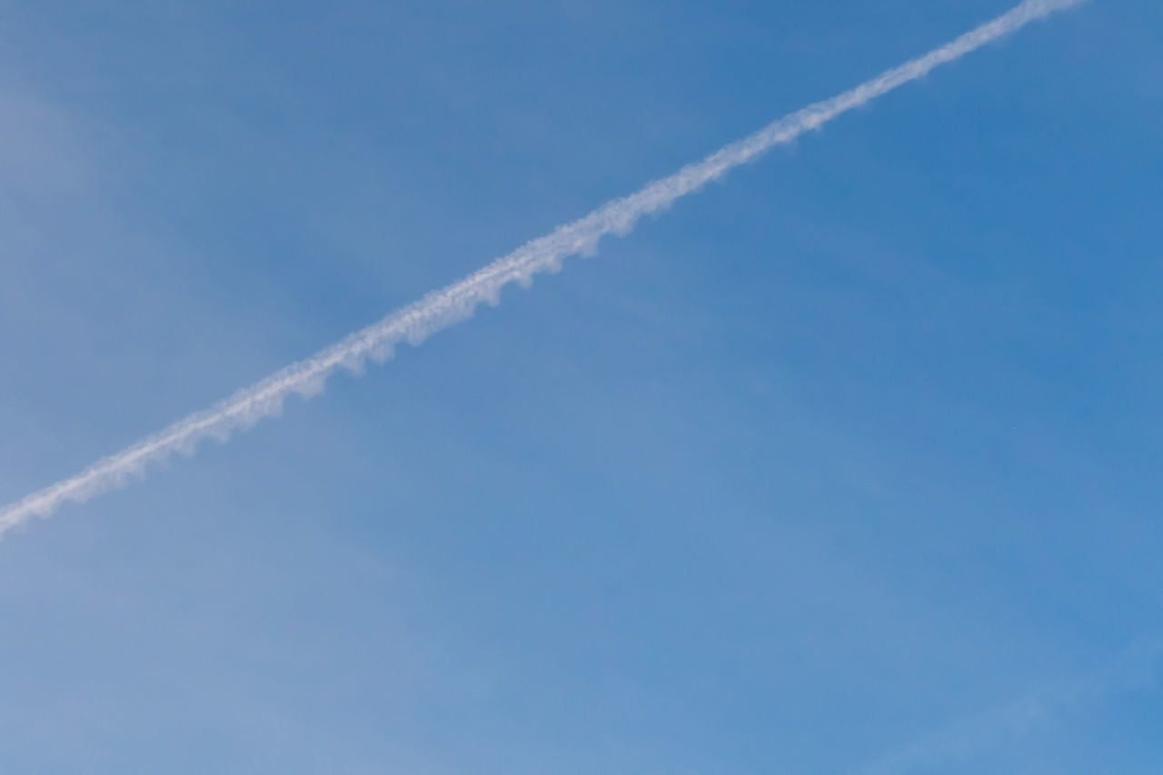 LOW ANGLE VIEW OF VAPOR TRAIL AGAINST SKY