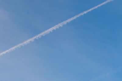 Low angle view of vapor trail in sky