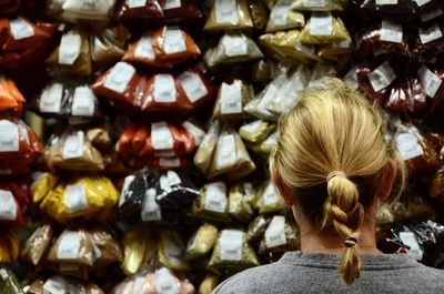 Rear view of woman in store