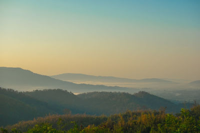 Scenic view of mountains against sky during sunset