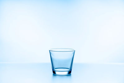 Close-up of water in glass against white background