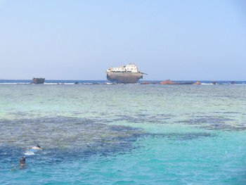 Scenic view of sea against clear sky