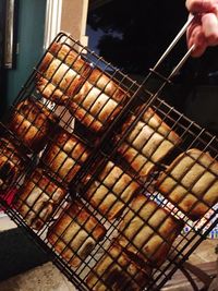 Midsection of man cooking on barbecue grill