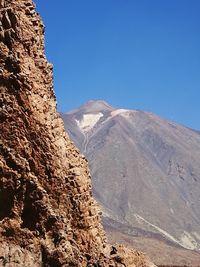 Scenic view of mountains against clear sky