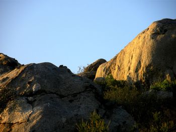 Low angle view of mountain against clear sky