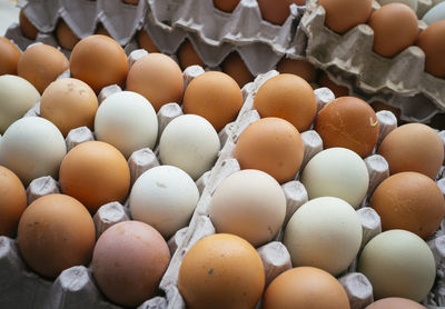 Close-up of eggs in carton for sale at market