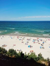 High angle view of beach against blue sky