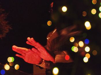 Close-up of illuminated christmas tree at night