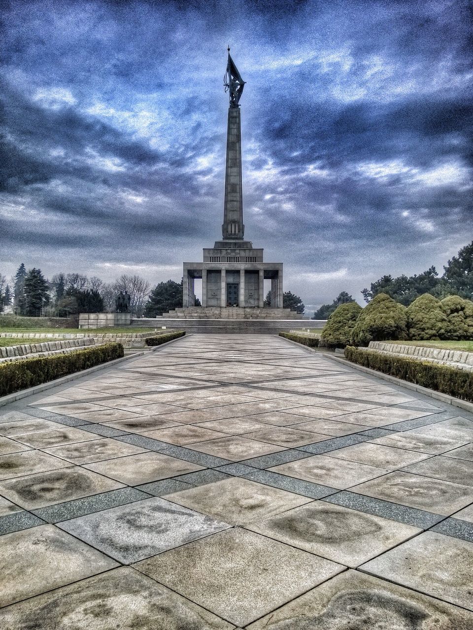 sky, built structure, architecture, cloud - sky, famous place, building exterior, tower, cloudy, religion, travel destinations, international landmark, tree, history, tourism, spirituality, travel, cloud, place of worship