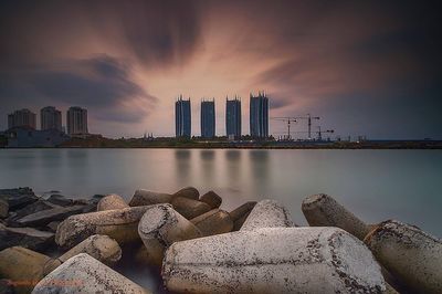 View of city against cloudy sky