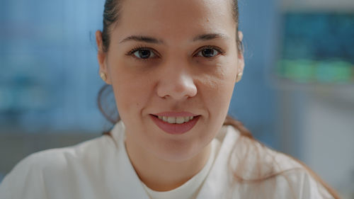 Close-up portrait of young woman