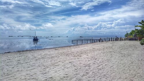 Scenic view of beach against sky