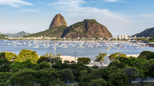 Scenic view of bay against sky