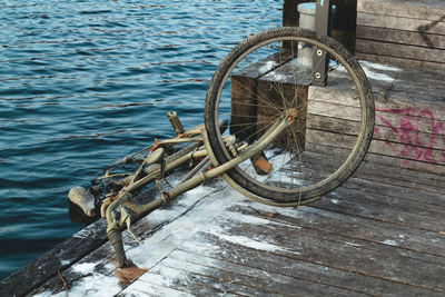 Close-up of damaged old and rusty bicycle