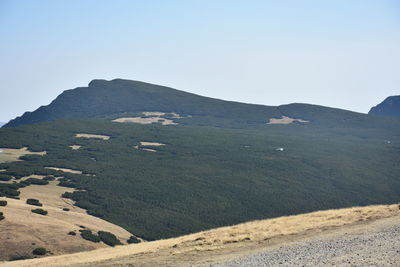 Scenic view of mountains against clear sky