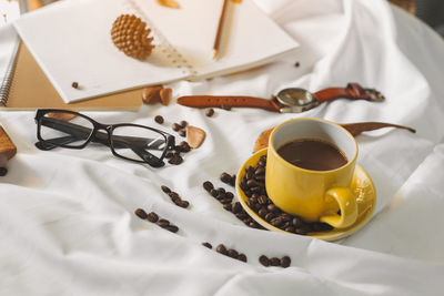 High angle view of coffee cup on table