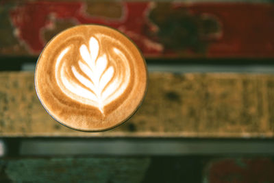 Close-up of cappuccino on table