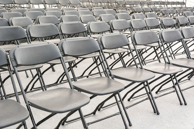 High angle view of empty chairs and table