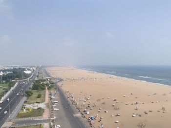 High angle view of road by sea against sky