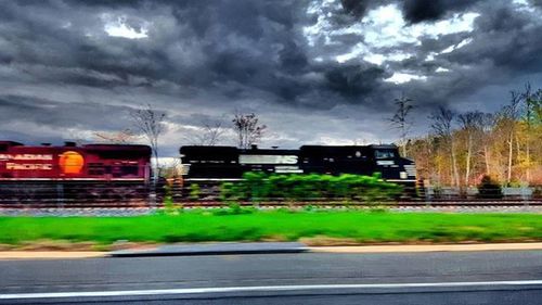 Cloudy sky over road