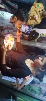 High angle view of children and woman