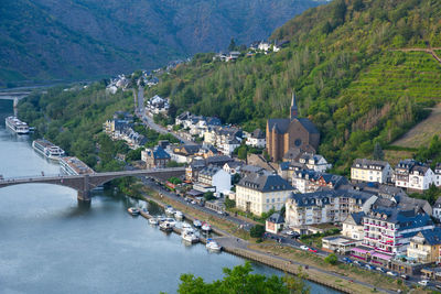 High angle view of river amidst buildings in city