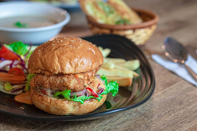 Close-up of burger in bowl on table