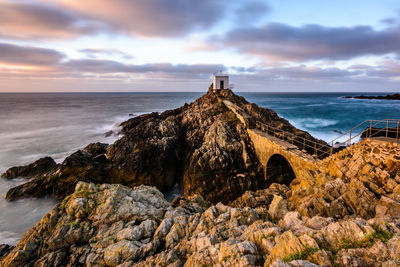 Panoramic view of sea against cloudy sky